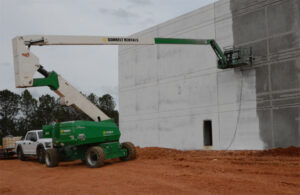 A PaintJet robot applying the company's paint to a building.